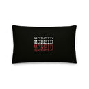Rectangular black lumbar pillow shown straight-on against a plain white background. Centered on the pillow, the word ‘MORBID’ is stacked three times in capital letters. The top two lines are embroidered in white, slightly offset for a layered effect, and the bottom line is embroidered in bold red. The raised stitching contrasts against the smooth black fabric.