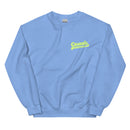 Light blue crewneck sweatshirt laid flat, showing front left chest print of the word 'Casuals' in large yellow script and 'WITH KATIE NOLAN' in smaller all-caps yellow text beneath it.