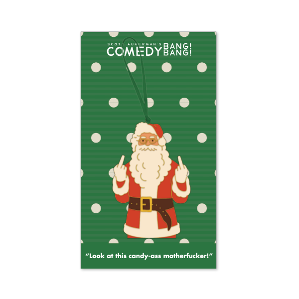 Green backer card with white polka dots and the text ‘Scott Aukerman’s Comedy Bang! Bang!’ at the top. The ornament depicts Santa Claus in a red suit with glasses, holding up both middle fingers, hanging from a green ribbon. Text at the bottom reads ‘Look at this candy-ass motherfucker!’