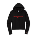 Front product view of a black cropped hoodie with bold red gothic blackletter text reading ‘Weirdly Immortal’ across the chest. Features a drawstring hood, cropped silhouette, long sleeves, ribbed cuffs and hem, and a small print near the wearer’s left cuff reading ‘MORBID Live’.
