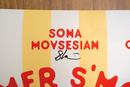 Close-up of the top portion of the 'Summer S’mores with Conan & The Chill Chums' poster focusing on the yellow-and-white striped background behind 'Sona Movsesian' and her signature in black ink.