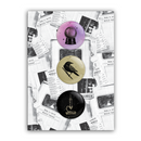 Product display of three round pin buttons arranged vertically on a collage-style background of grayscale documents and images. Designs include a purple crystal ball illustration on a lavender background with small stars, a black crow on a beige textured background, and a black button with a lit candle dripping wax into a coiled snake below.