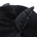 Close-up detail of the hoodie’s hood showing one of the small horn-like protrusions. The black washed fabric has a soft, slightly faded texture with visible stitching along the seam.
