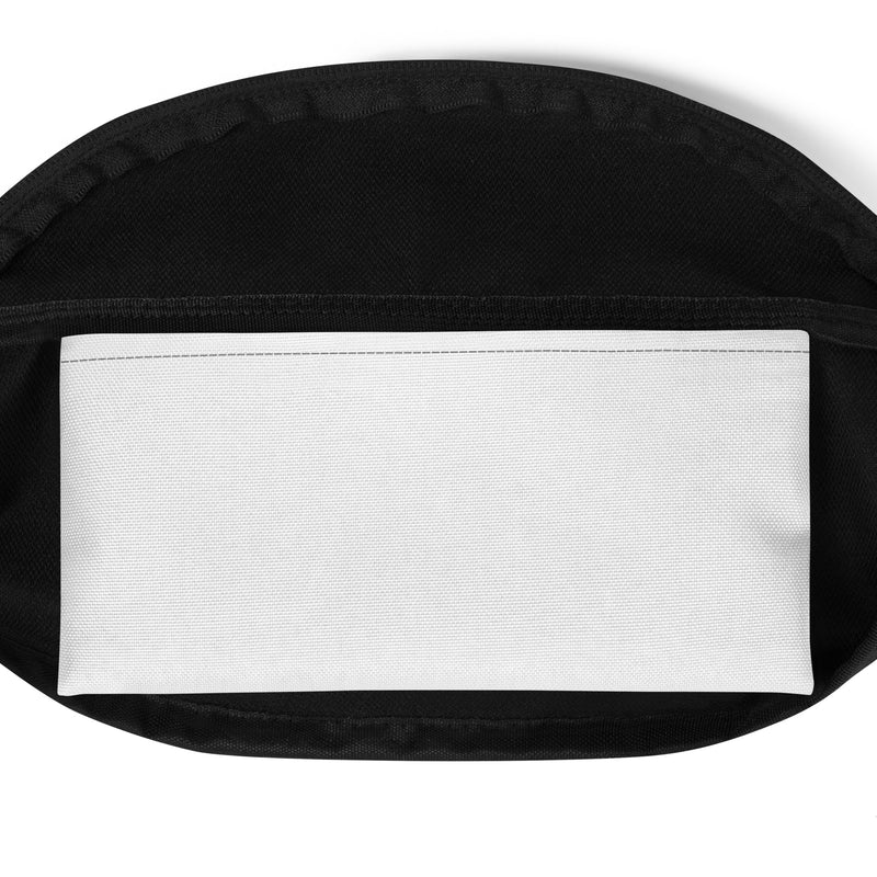A close-up of the inside of a black fanny pack showing a white inner pocket panel and black interior lining, with the top zipper partially open.