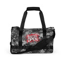 Camouflage duffel bag with 'Busted Open' graphic printed in red and white.