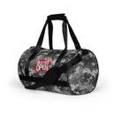 Camouflage duffel bag with 'Busted Open' logo in red on the side.