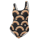A black one-piece swimsuit with a repeating rainbow-colored 'BYEEEEEEE' graphic print, featuring a white 'SiriusXM' logo on the left hip.