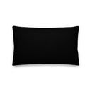 Rectangular black lumbar pillow shown from the back on a plain white background. The pillow has a smooth, solid black fabric surface with clean stitched edges and slightly rounded corners. No text or graphics are visible on this side.