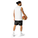 Back view of a person holding a basketball while wearing black mesh shorts printed with a grey caduceus pattern—a staff with wings and two snakes, often used to represent healthcare.