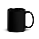 Black coffee mug with hands holding a planet and colorful text reading 'Stars and Stars with Isa'