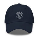 Navy baseball cap featuring a circular embroidered logo of an illustrative Conan face.