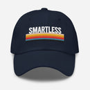 A navy baseball cap with the word 'SMARTLESS' embroidered in white above a colorful striped design.
