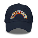 A navy blue dad hat with the word 'BYEEEEEEEE' embroidered in a rainbow arc across the front, featuring bold letters in white, yellow, red, orange, and blue thread.