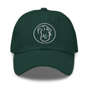Front view of a dark green spruce dad hat featuring a white embroidered line-art logo centered on the crown. The design shows a stylized outline of Conan O’Brien’s face with swooping hair inside a circular border. The hat has a curved brim and visible stitching along the bill.