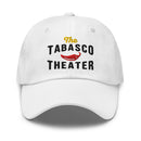 A white dad hat with embroidered text that reads 'The TABASCO THEATER' in black and yellow, with a red chili pepper graphic centered between the words.