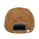 Back view of a brown corduroy cap with an adjustable strap and a button on top.
