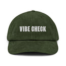 Green corduroy cap with the text 'VIBE CHECK' embroidered in white on the front.