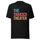 Flat lay of a black unisex T-shirt featuring the text ‘THE TABASCO THEATER’ in large marquee-style letters. ‘THE’ is in light blue, ‘TABASCO’ is in red, and ‘THEATER’ is in orange, all with white bulb-style dots to mimic a retro theater sign.