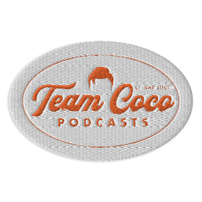 Logo for 'Team Coco' Podcasts featuring stylized text and an orange outline on a textured background.