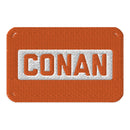Embroidered patch with the word 'CONAN' in bold letters on a textured orange background.