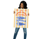 A woman in ripped jeans holds up a vertical 18x24 poster featuring red text that reads 'Summer S’mores with Conan & the Chill Chums' above blue cartoon fish, set against vertical orange and white stripes. The top of the poster lists 'Conan O'Brien', 'Sona Movsesian', and 'Matt Gourley'.