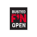 Sign with the words 'BUSTED F'N OPEN' in bold red and white letters on a black background.