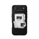 Matte black MagSafe tough iPhone case on a white background featuring a centered black-and-white collage design resembling stacked documents and clippings. Visible text includes ‘Keep it weird,’ ‘Morbid Podcast,’ ‘MORBID,’ and ‘05012018,’ arranged as a single layered graphic in the middle of the case.