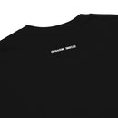 Close-up of the upper back of a black T-shirt, showing small white printed logos: 'SiriusXM' on the left and 'SMARTLESS' on the right.