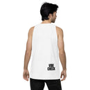 Man wearing a white tank top shown from the back, with black text that says 'VIBE CHECK' placed low near the right hem of the shirt; he is dressed in black jeans and looking to the side.