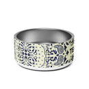 Ceramic pet bowl featuring a decorative design and the logo 'TEAMCOCO' in bold letters