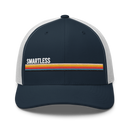 Baseball cap with a navy front, white mesh sides, and the word 'SMARTLESS' in white above a colorful horizontal stripe.