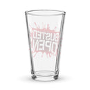Pint glass with red splatter design featuring the 'BUSTED OPEN' logo.