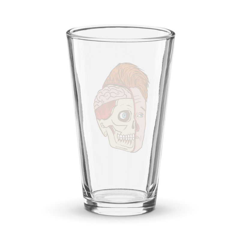 Glass pint glass featuring a split illustration of a human head showing both a brain and a skull design.