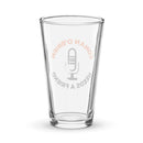 Clear pint glass featuring text 'Conan O'Brien Needs A Friend' with a microphone graphic in the center.