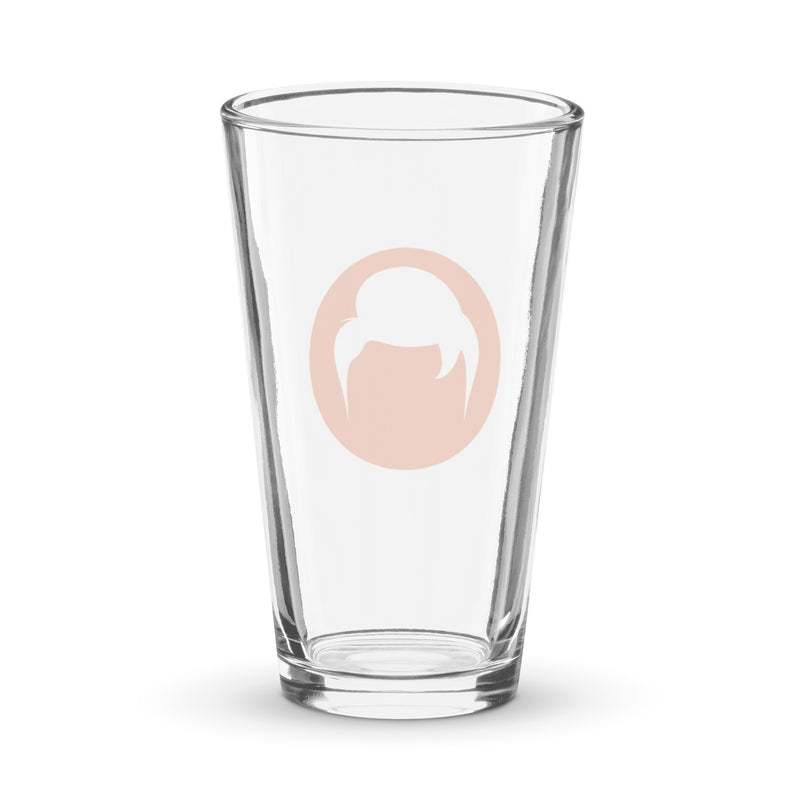 Clear glass pint glass with an orange circle logo featuring a stylized white design of a head with hair