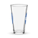 Side view of clear pint glass partially showing front and back designs. 