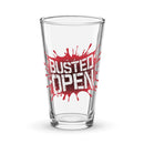 Pint glass with red splatter design featuring the 'BUSTED OPEN' logo.