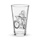 Illustration of a character riding a motorcycle with a sombrero on a glass, featuring text 'Comedy Bang! Bang!'