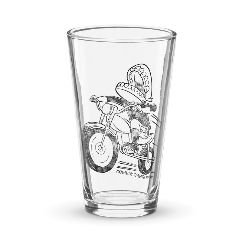Illustration of a character riding a motorcycle with a sombrero on a glass, featuring text 'Comedy Bang! Bang!'
