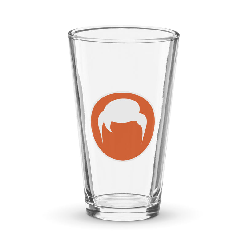 Clear glass pint glass with an orange circle logo featuring a stylized white design of a head with hair