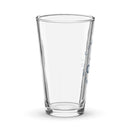 Pint glass featuring a design with the logo 'Comedy Bang! Bang!' and an illustration of a character on a motorcycle.