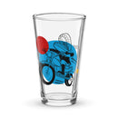 glass featuring illustration of a motormouth against a colorful background