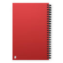 The back cover of a red spiral notebook shown flat on a white background.