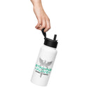 Hand holding a white stainless steel water bottle by the built-in black plastic handle attached to the straw lid. The bottle is angled downward, clearly displaying the caduceus graphic and the 'STAYING ALIVE' text in teal, with 'JON GABRUS' and 'ADAM PALLY' printed below in black.