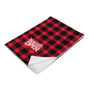 Red and black plaid blanket with 'Busted Open' logo on top.