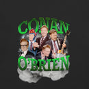 Front view of black unisex T-shirt featuring a large graphic reading ‘CONAN O’BRIEN’ in bold three-dimensional bright green block letters. Behind the text are multiple images of Conan O’Brien in different poses, including wearing a futuristic helmet, clapping, playing a guitar, and making hand gestures. White lightning bolts and gray clouds surround the collage, creating a dramatic rock-concert style design.