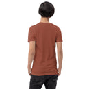 Heather clay short-sleeve t-shirt shown from the back with no visible graphics, worn by a man standing in black jeans.