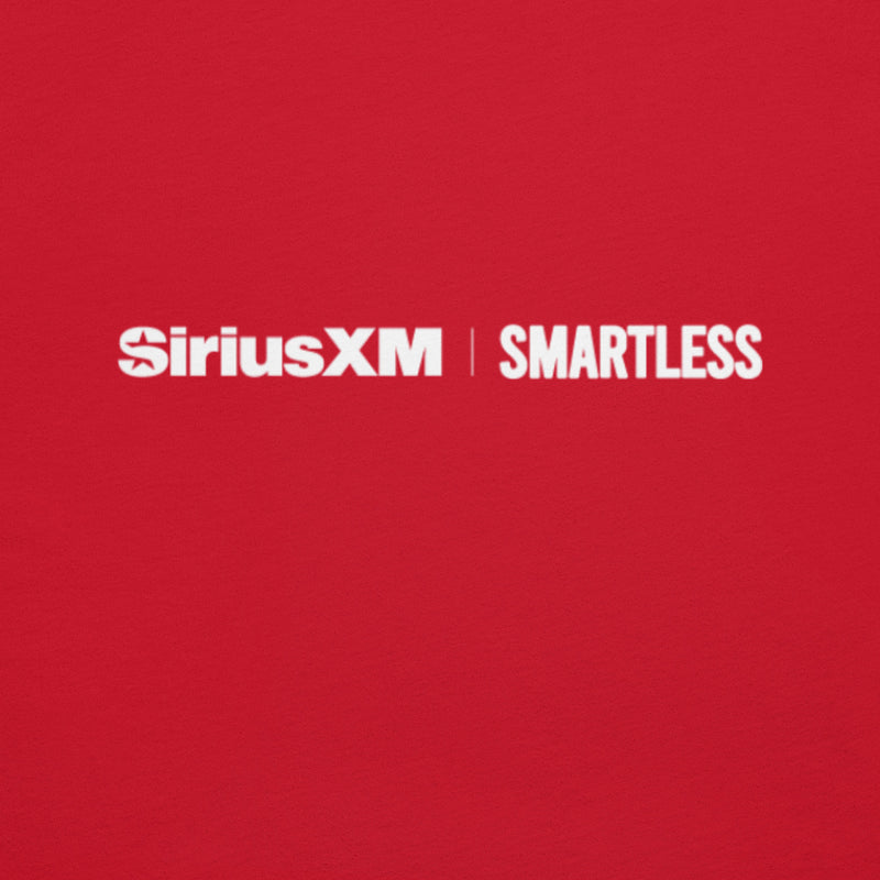 A close-up shot of the back of a red shirt showing the 'SiriusXM' and 'SMARTLESS' logos printed in white near the collar.