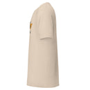 beige t-shirt displayed from the side with graphic design on the front featuring text and logo elements