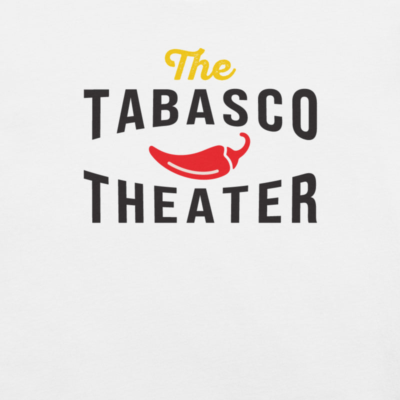 A close-up of a white shirt showing the design that reads 'The TABASCO THEATER' in stylized black and yellow lettering, with a red chili pepper illustration in the center.